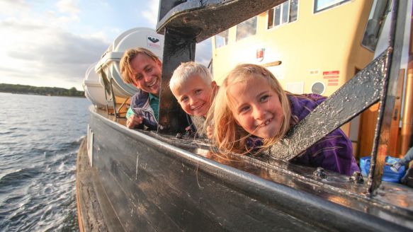 Family on the ferry to Egholm