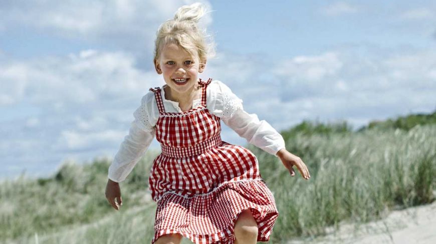 Holiday girl on the coast in North Jutland